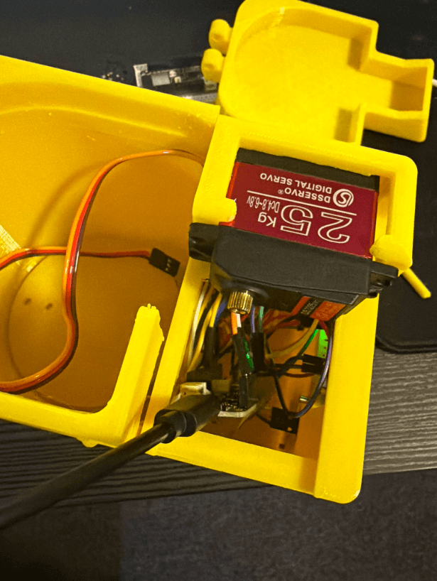 Internal servo and wiring layout inside the Soda Can Prevention Device
